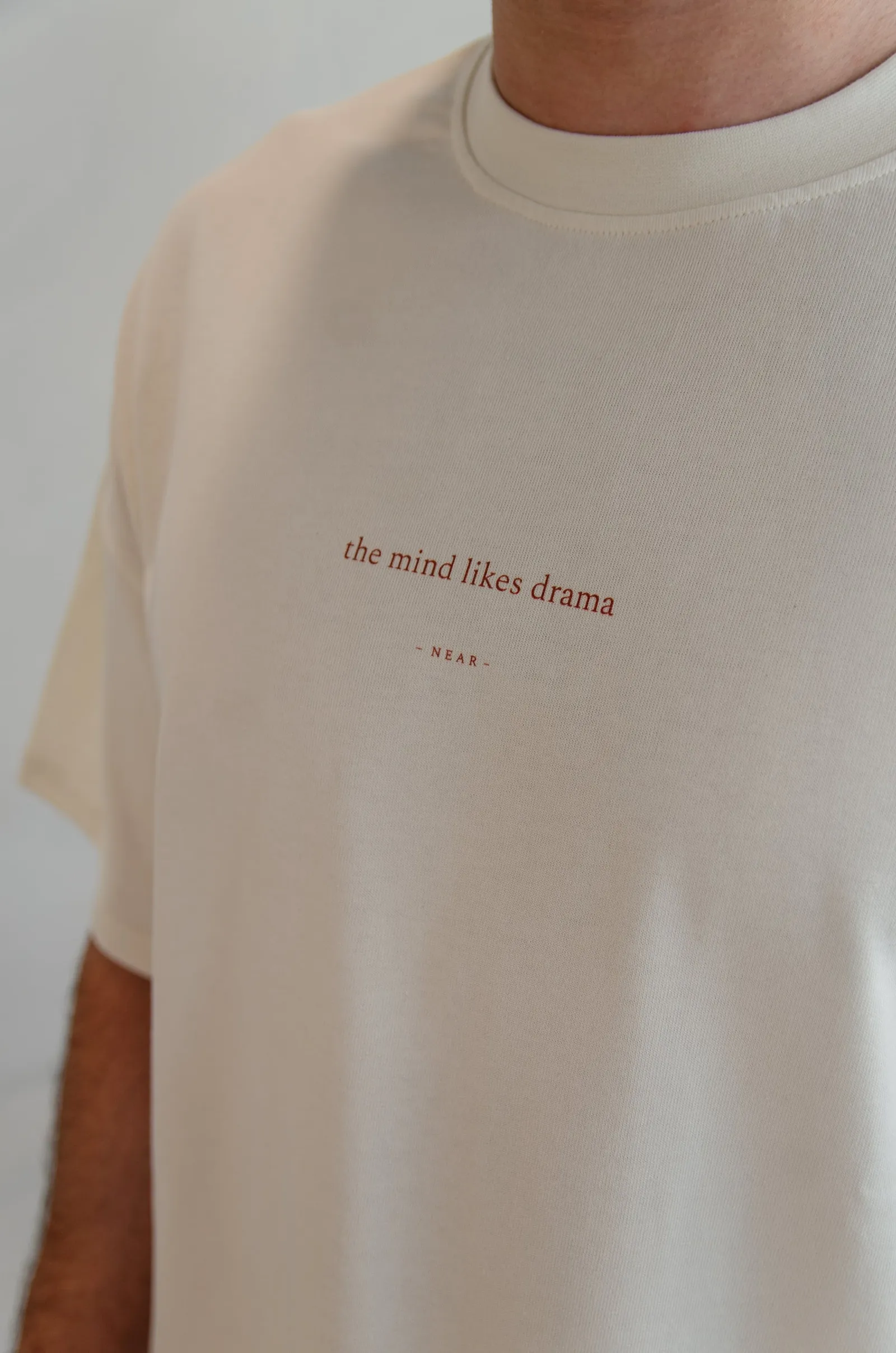NEAR heavyweight vintage-white tee printed “the mind likes drama” — photo 6 of 11.