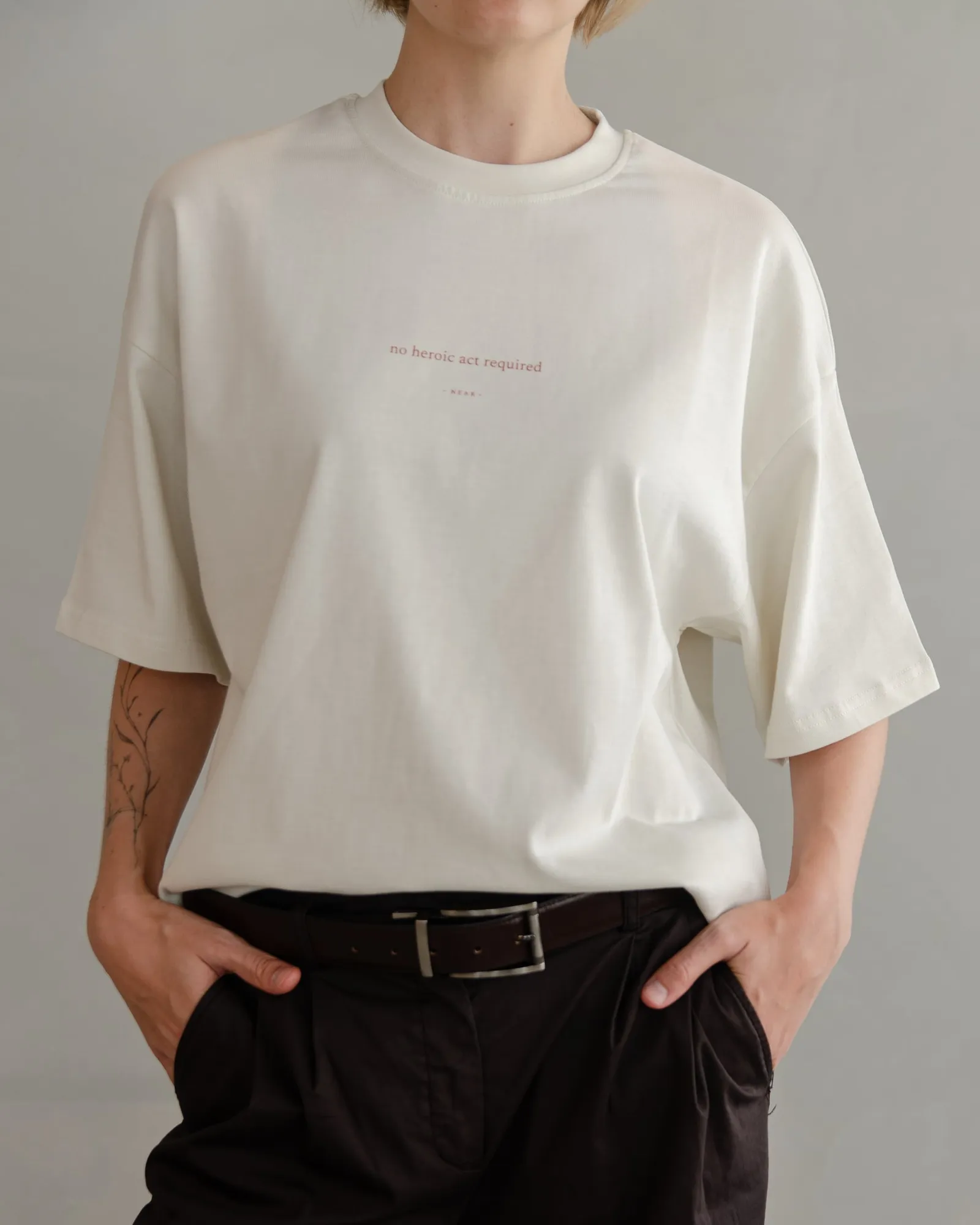 NEAR First Drop — heavyweight vintage-white tees, cut oversized.
